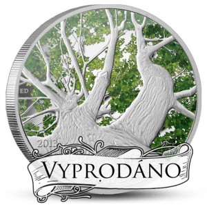 Atraktivnív vyobrazení kanadského javorového stromu na kolorované minci